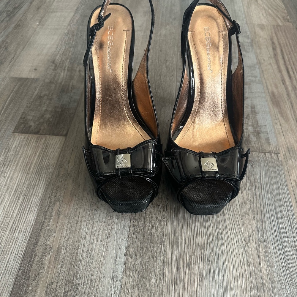 BCBGMaxAzria Black Peep-Toe Heels with Bow Accent